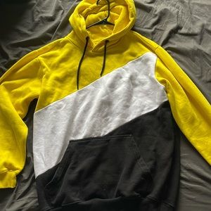 Yellow, black and white sweatshirt